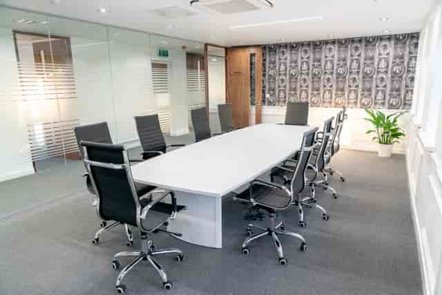 Modern conference room with oval table in Foundry House, ideal for meetings and brainstorming.