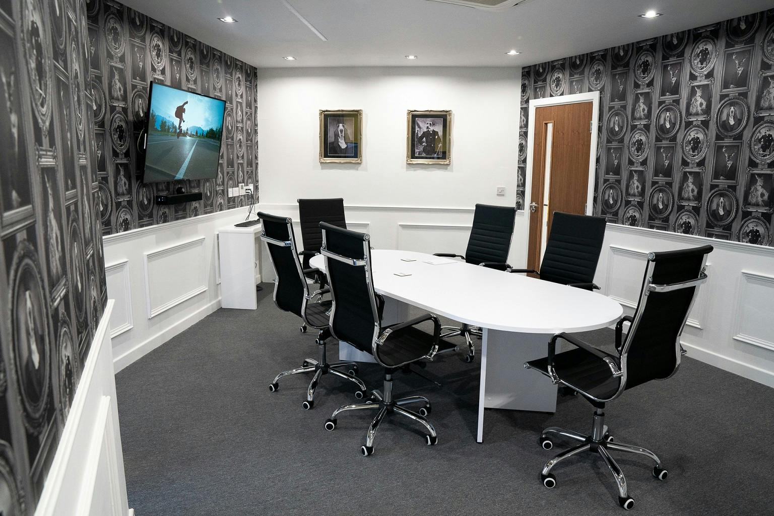 Modern meeting room in Foundry House, Widnes with oval table for collaborative sessions.