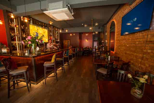 Stylish BAR 8 venue with warm ambiance, ideal for networking events and private parties.