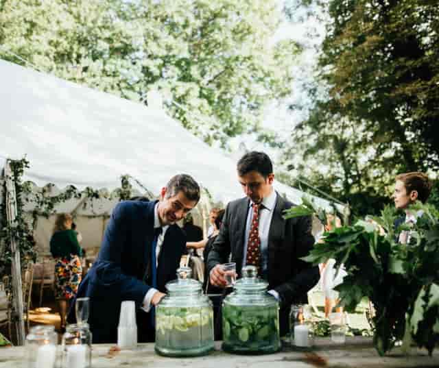 Outdoor event venue in Secret River Garden with lush greenery and elegant decor.