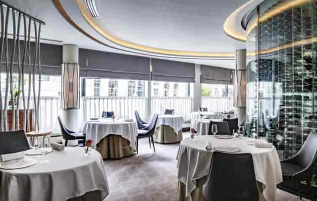 Sophisticated dining space at Petrus for upscale events and intimate meetings.