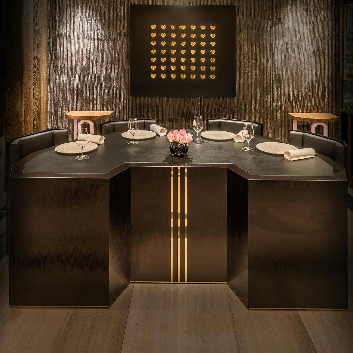 Exclusive Hire at Restaurant Gordon Ramsay with hexagonal table for corporate events.