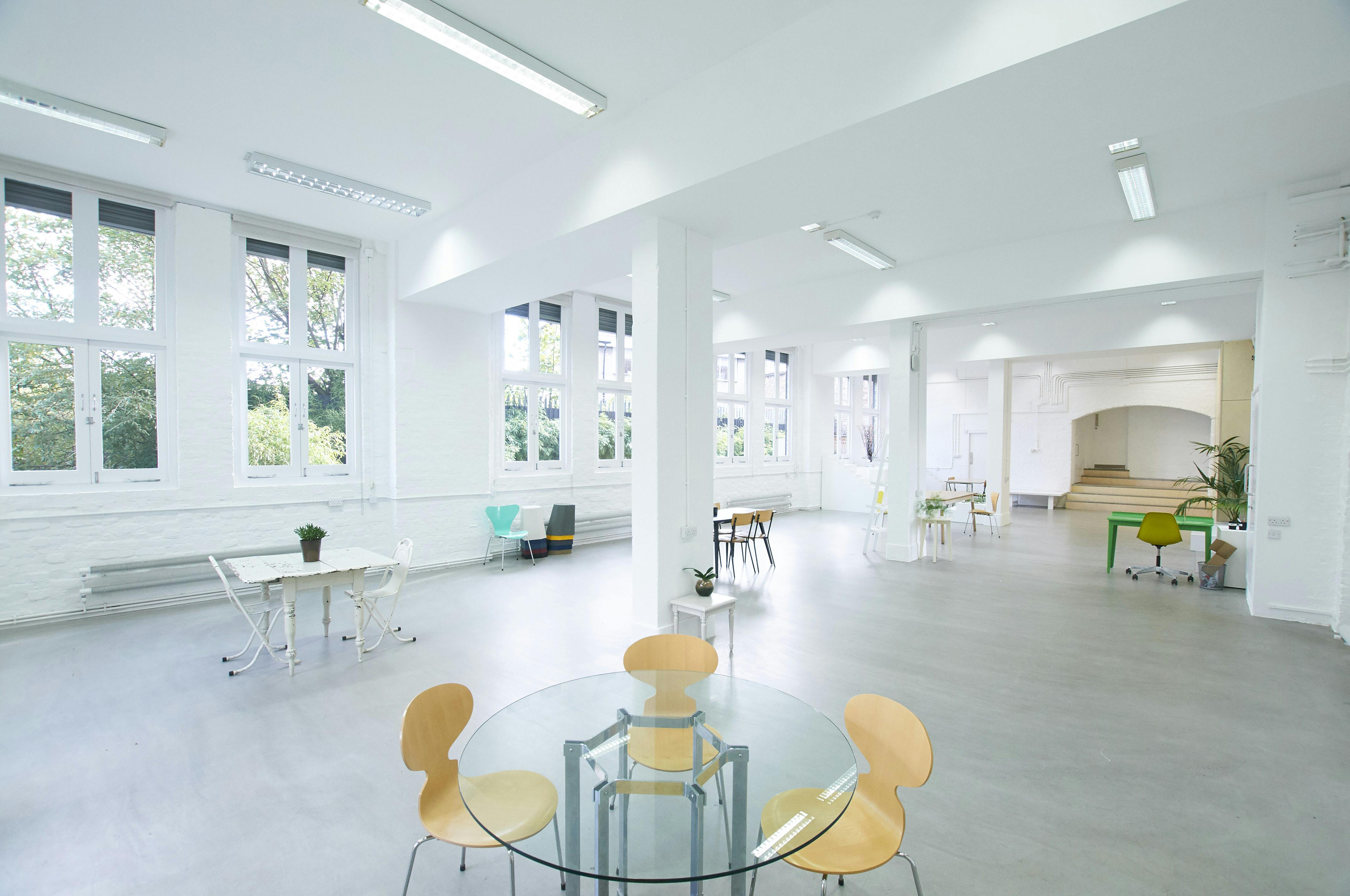 Bright, spacious event venue with natural light for workshops and networking events.