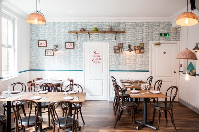 Cozy Agave Dining Room at Santo Remedio, perfect for intimate gatherings and meetings.