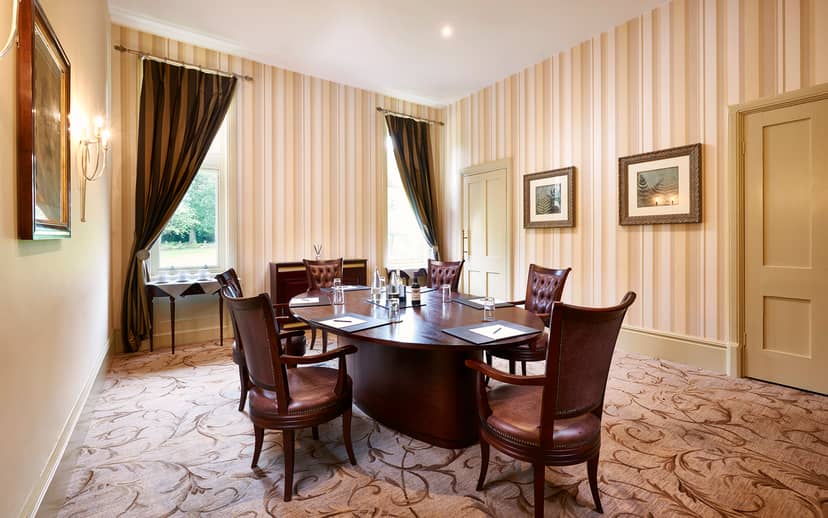 Sycamore Room at Rockliffe Hall: elegant meeting space with plush seating for gatherings.