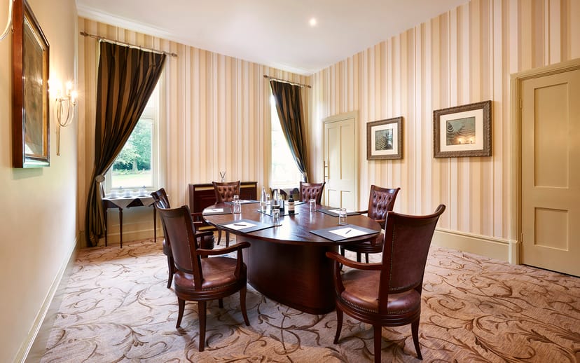 Sycamore Room at Rockliffe Hall: elegant meeting space with plush seating for gatherings.