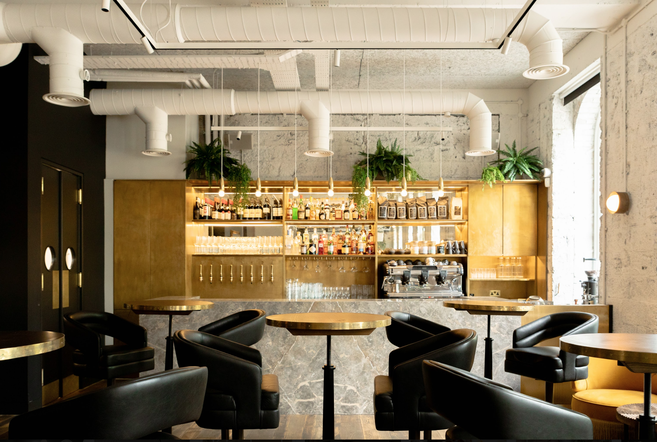 Stylish bar area in The Hall, Kindred, ideal for networking events and cocktail receptions. - Banner
