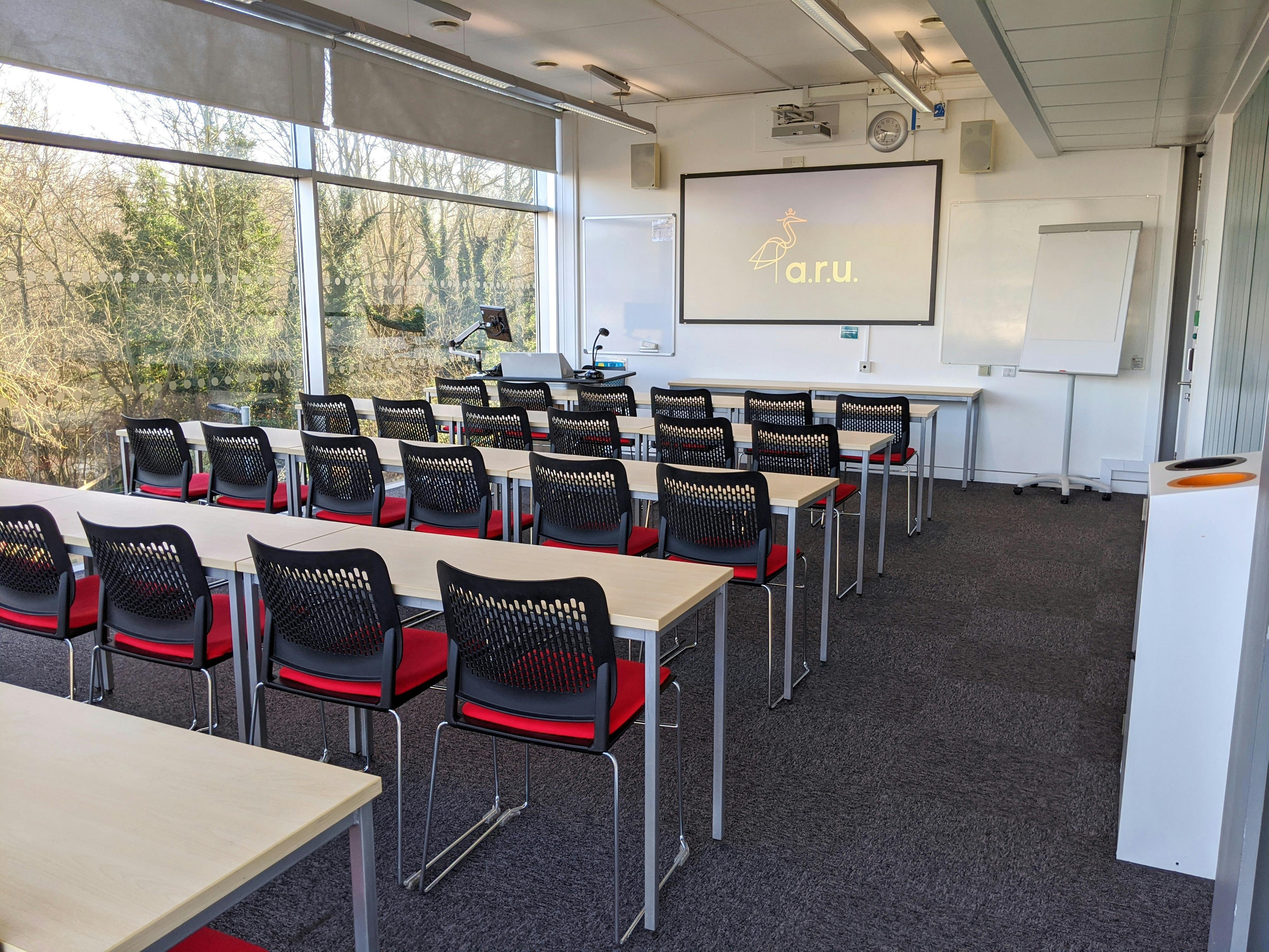 Small classroom with natural light for workshops at ARU Venue Hire, Chelmsford.