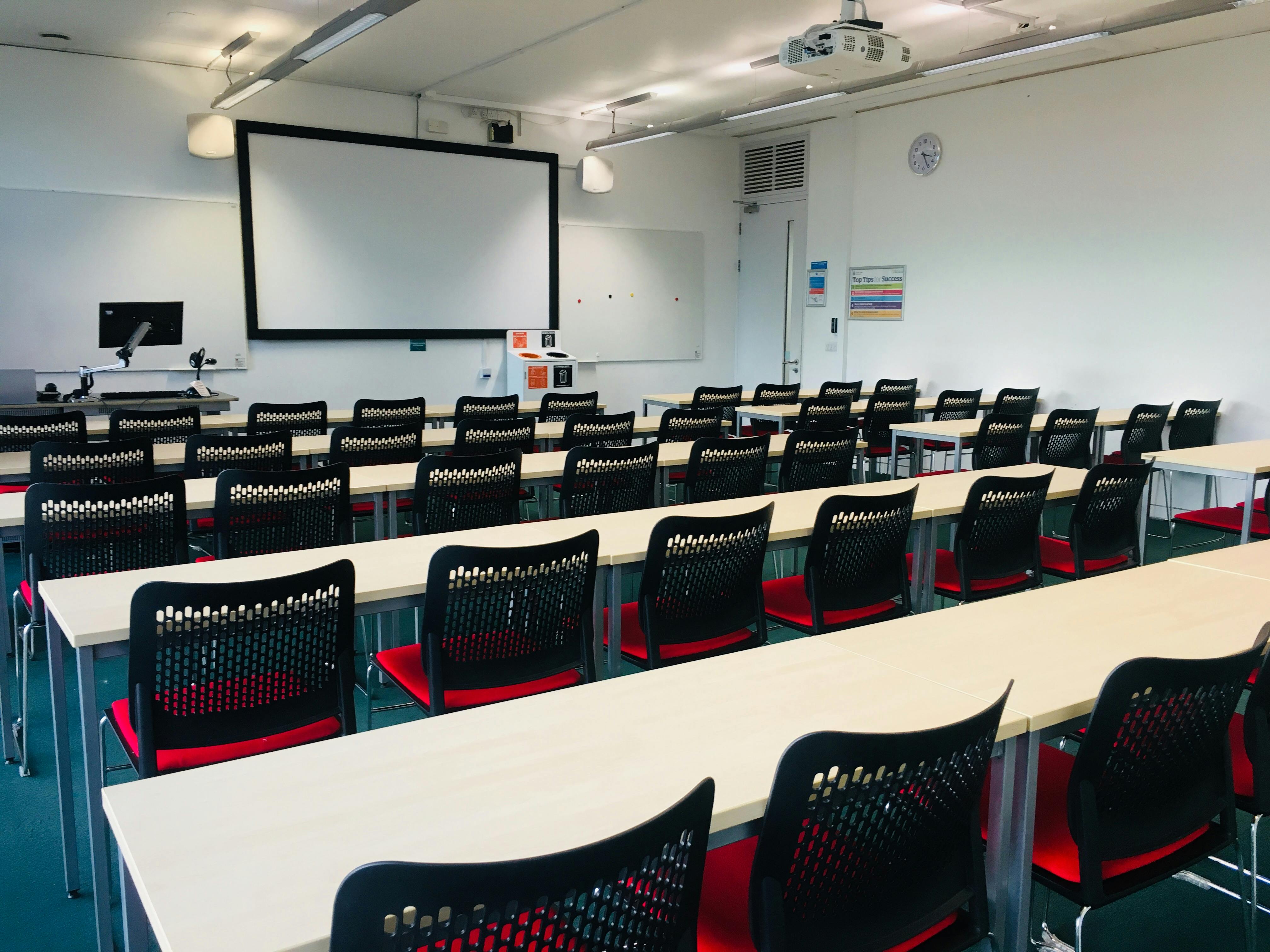 Large classroom with organized seating for presentations at ARU Venue Hire, Chelmsford.