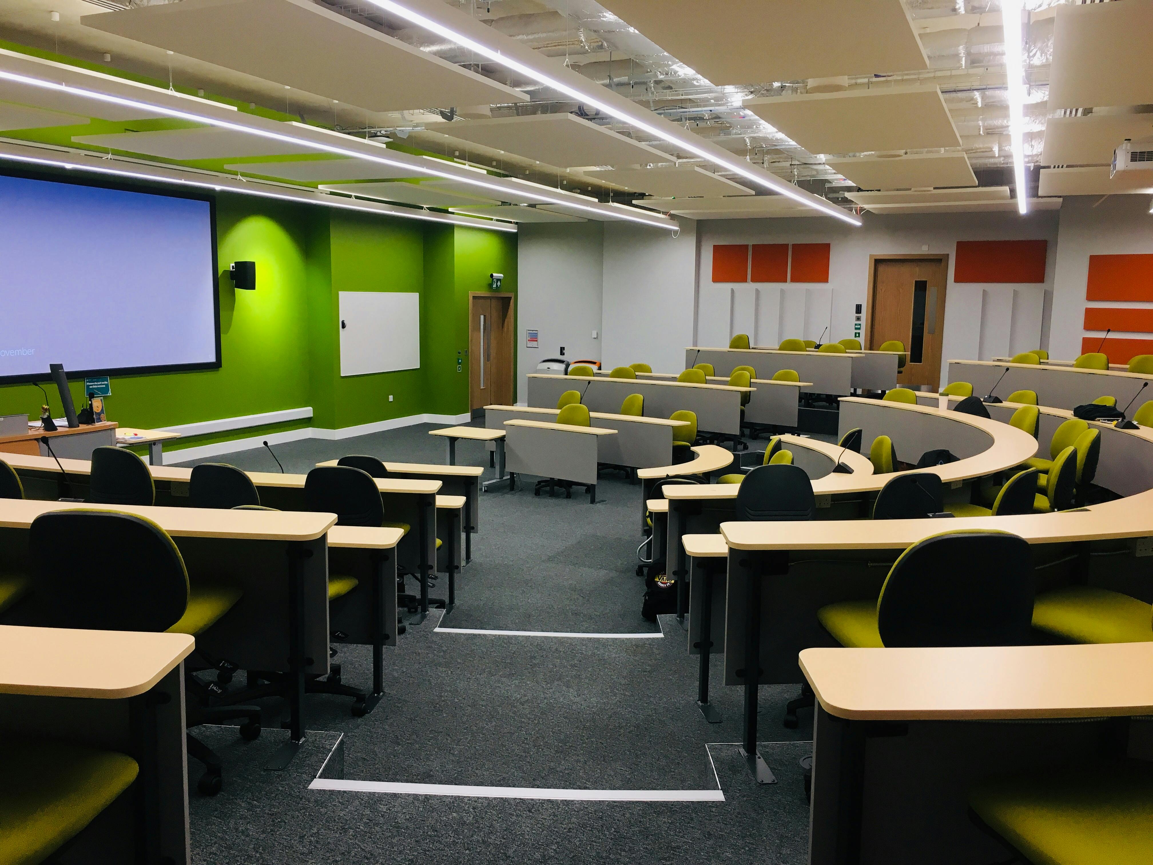 Modern meeting space with tiered seating for workshops and presentations in Chelmsford.