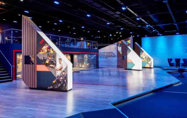 Modern event space with angled displays for conferences and product launches.