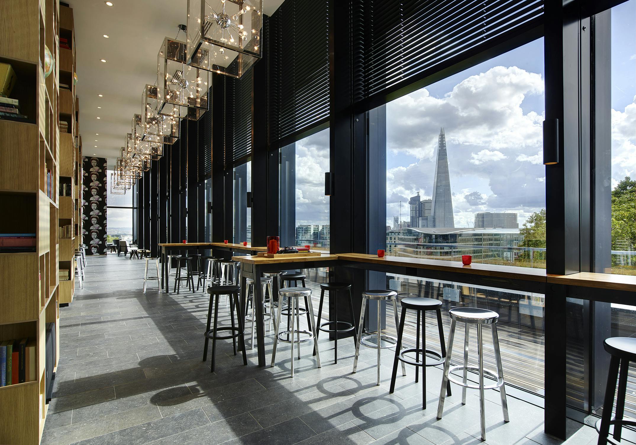 Modern event space in cloudM Tower, London with large windows and city views.