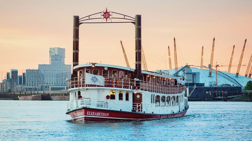 Elizabethan riverboat venue at sunset, ideal for corporate and social events.