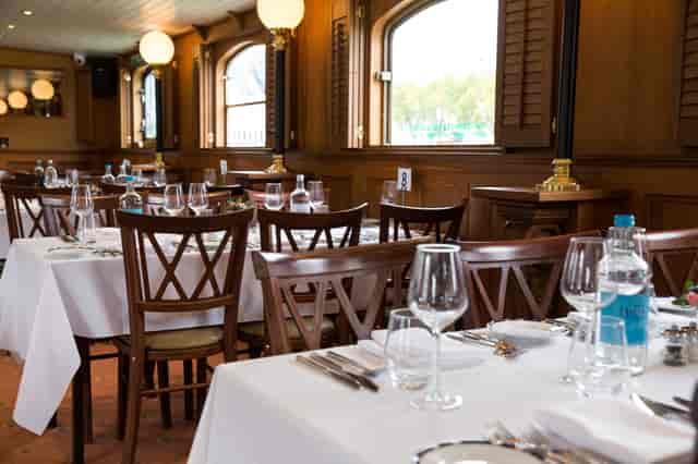 Elegant Edwardian dining venue with warm decor, perfect for intimate events and gatherings.