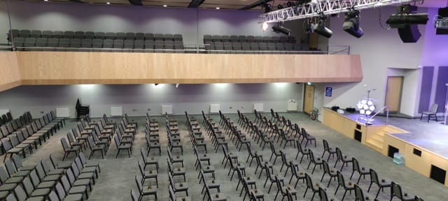 Auditorium at City Gates Conference Centre with rows of chairs for conferences and presentations.