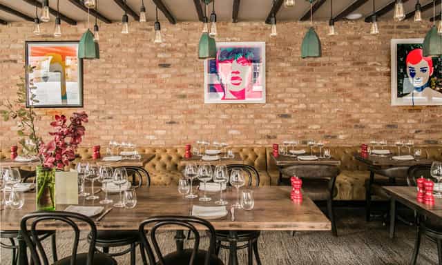 Wilfred's Lounge in Mayfair: stylish restaurant with elegant table settings for events.