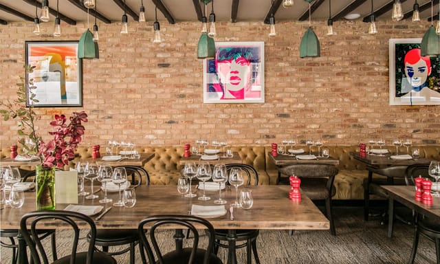 Wilfred's Lounge in Mayfair: stylish restaurant with elegant table settings for events.