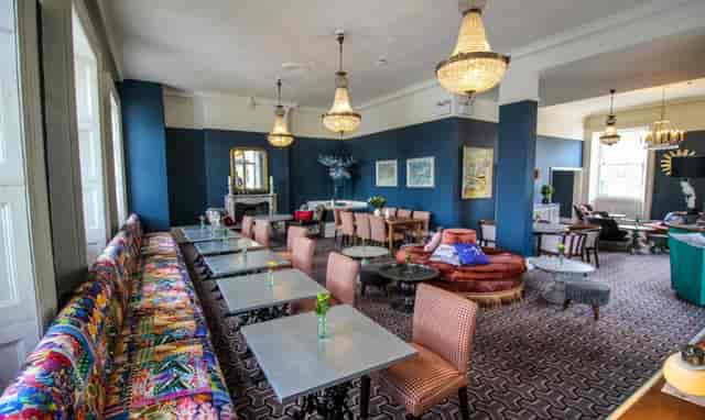 Stylish Lillie Lounge with vibrant seating, perfect for events and gatherings.