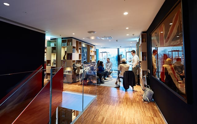 Modern open-concept meeting space in cloudM Tower, London for collaboration and networking.