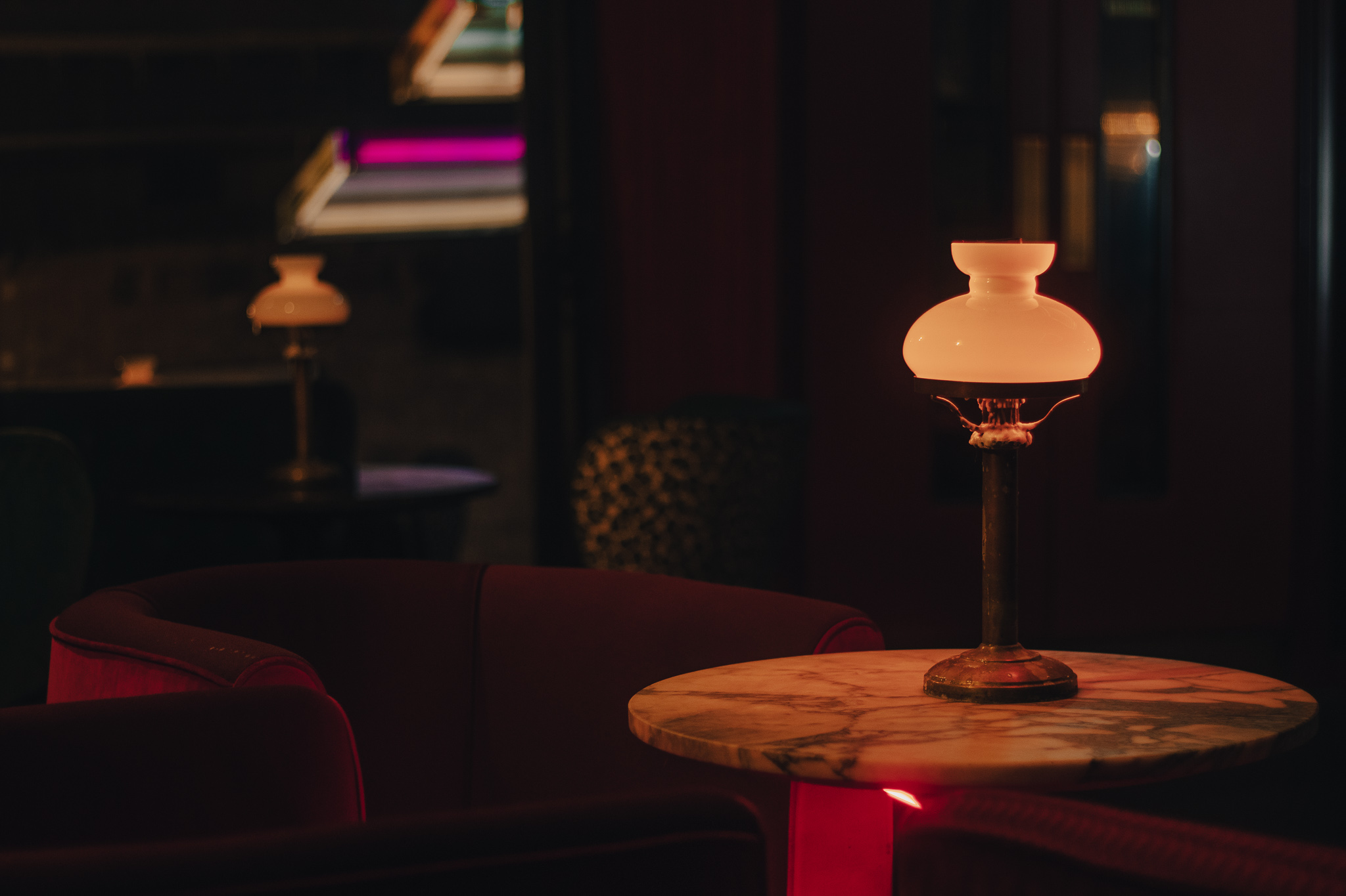 Intimate Red Room at Jack Solomons Club, ideal for networking events and gatherings. - Banner