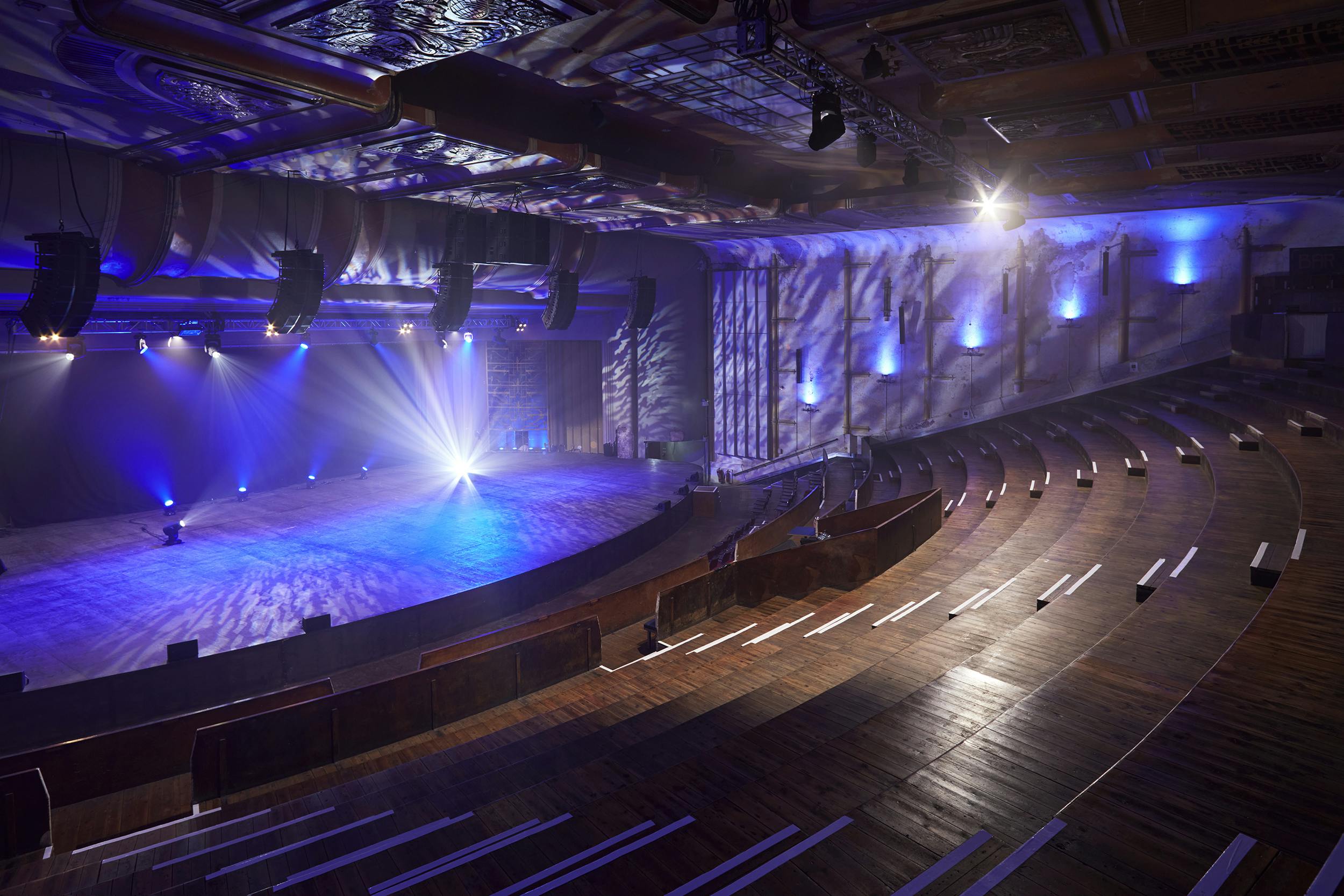Versatile Theatre in EartH with tiered seating for dynamic events and performances.