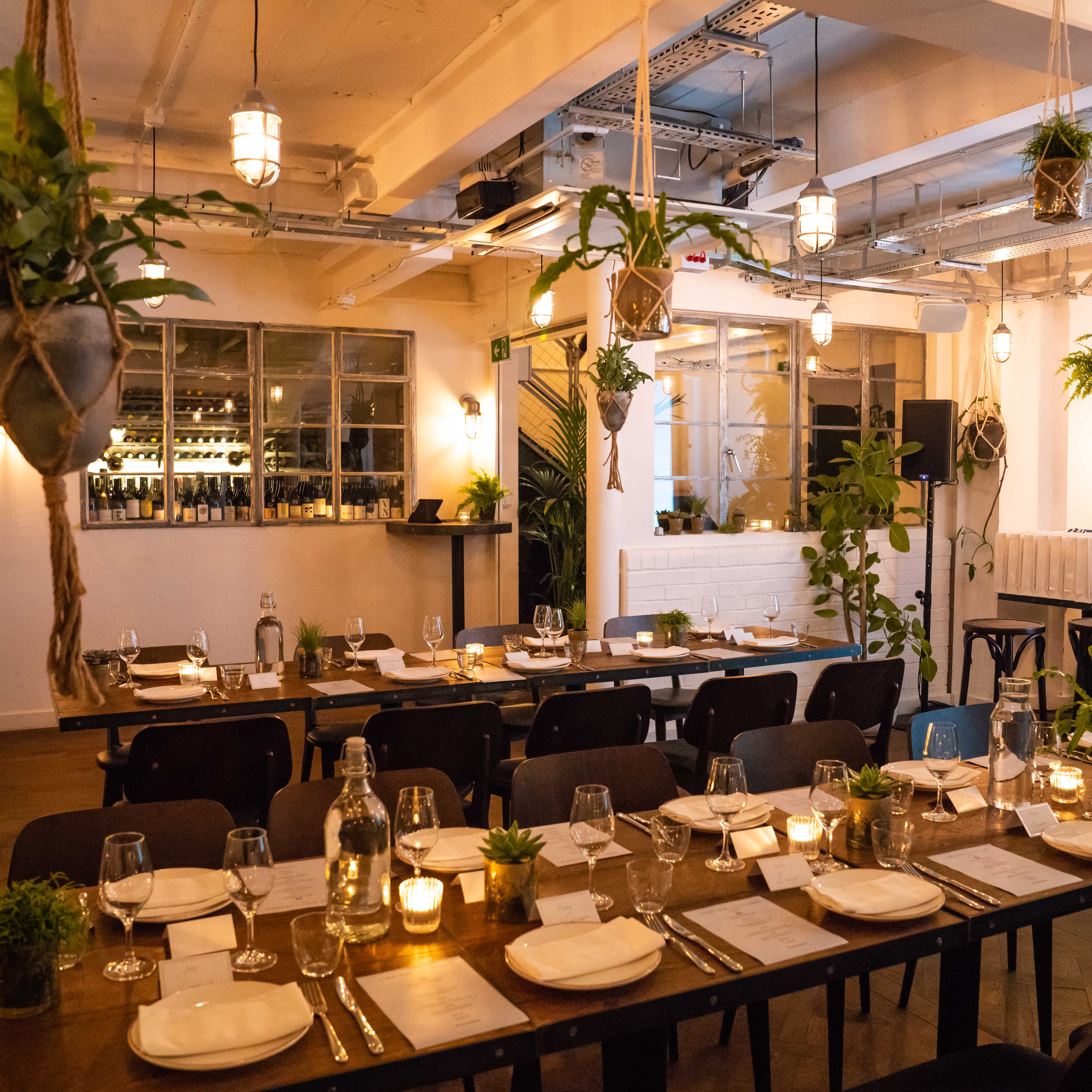Intimate wine room at FARE Restaurant, perfect for elegant dinners and celebrations. - Banner