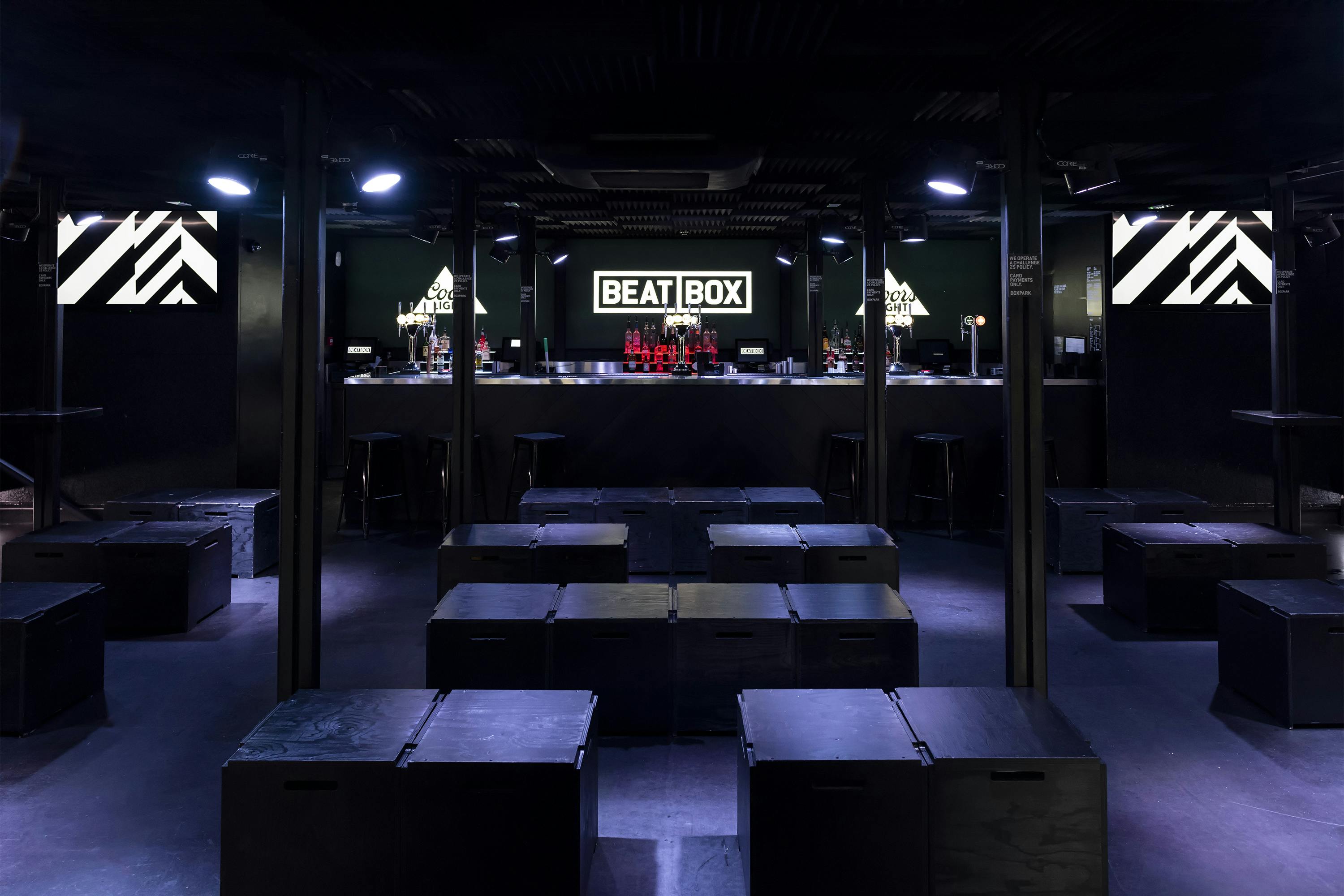 BeatBox at Boxpark Croydon: modern event space with sleek bar for nightlife and gatherings.