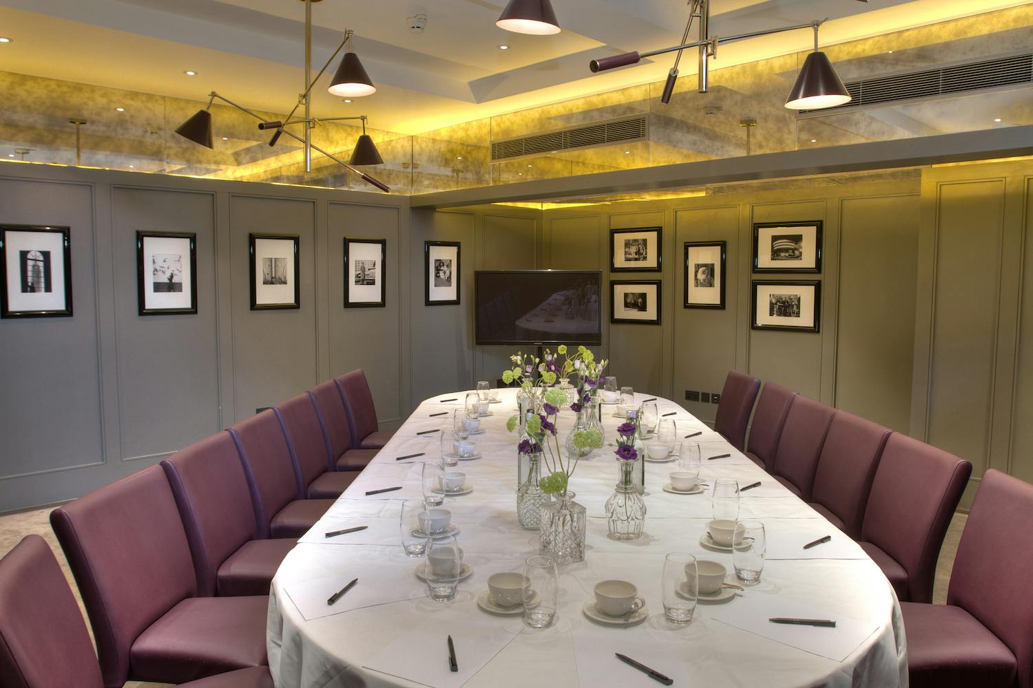 Elegant meeting room with oval table, perfect for board meetings in Covent Garden.