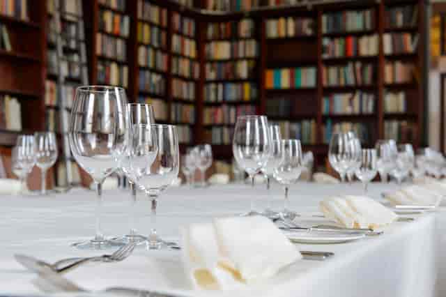Elegant dining table in The Library, Carlton House Terrace for corporate dinners and gatherings.