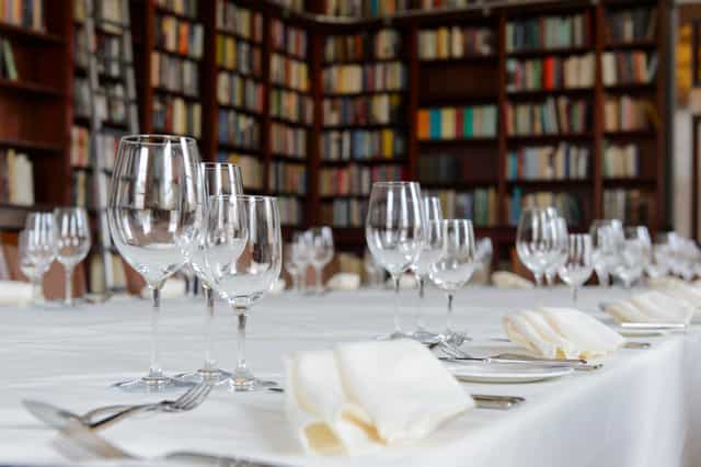 Elegant dining table in The Library, Carlton House Terrace for corporate dinners and gatherings.