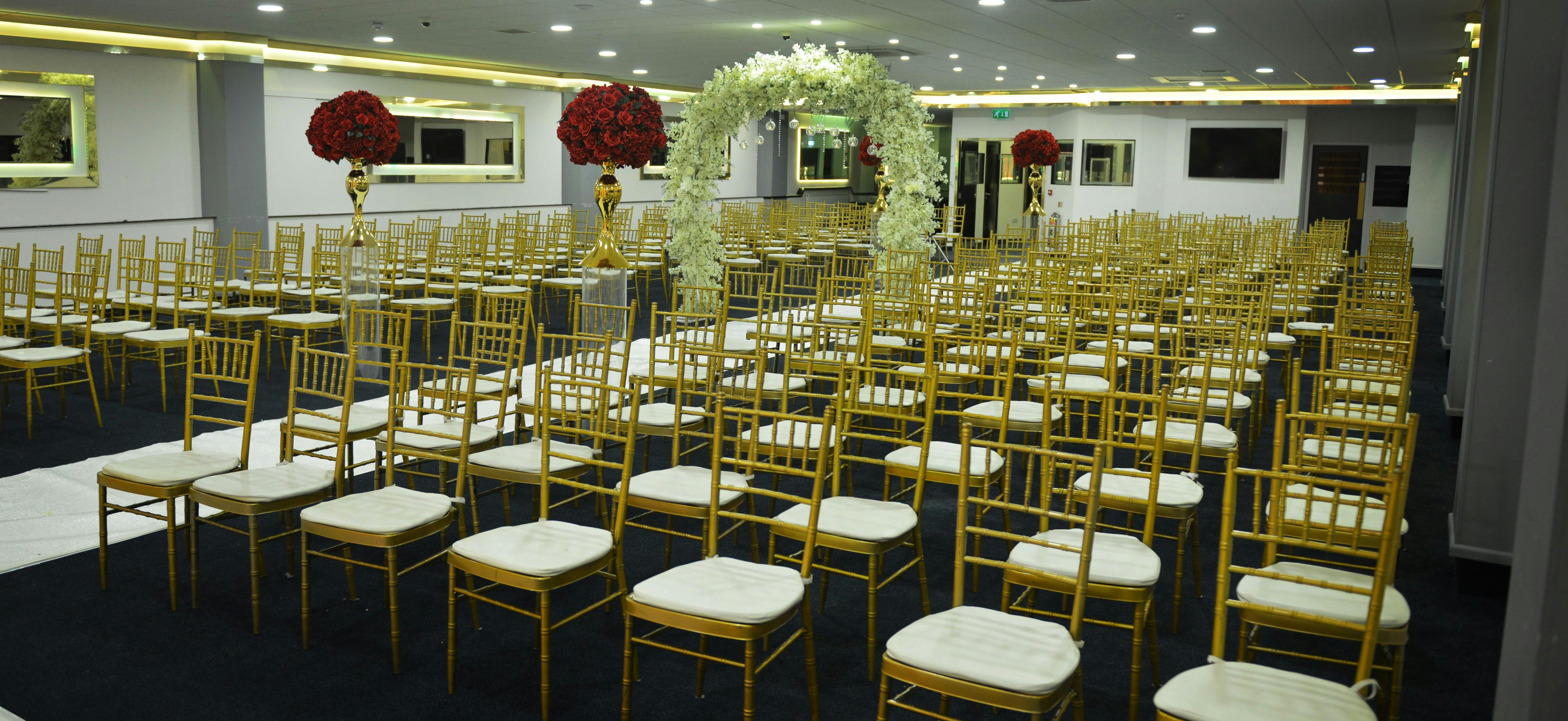 Elegant Golden Suite with chiavari chairs, perfect for formal gatherings and ceremonies.