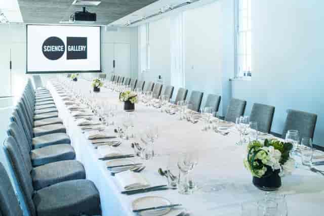Modern event space in Science Gallery London, set for corporate gatherings with elegant decor.