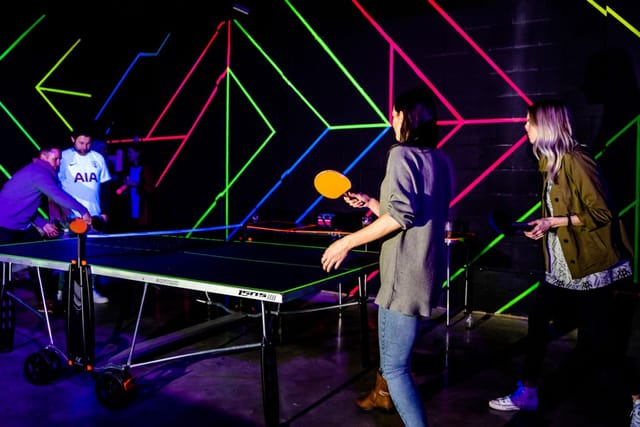 Playbox Room at Boxpark Wembley with ping pong setup for networking and team-building events.