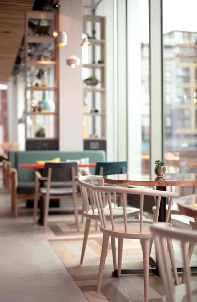 Modern meeting space at KuPP with natural light, ideal for networking events.