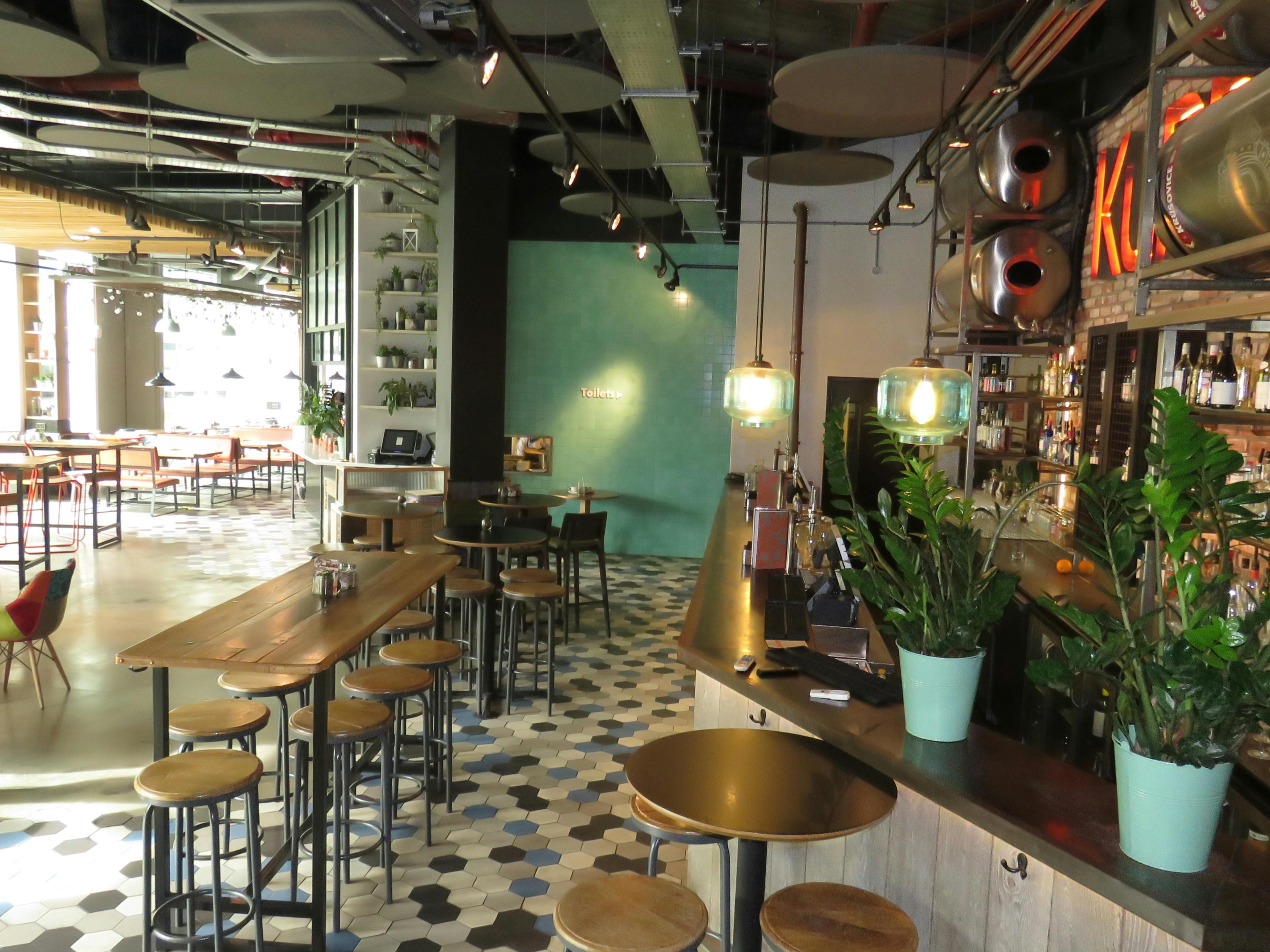 Modern bar in KuPP, ideal for networking events and casual meetings.