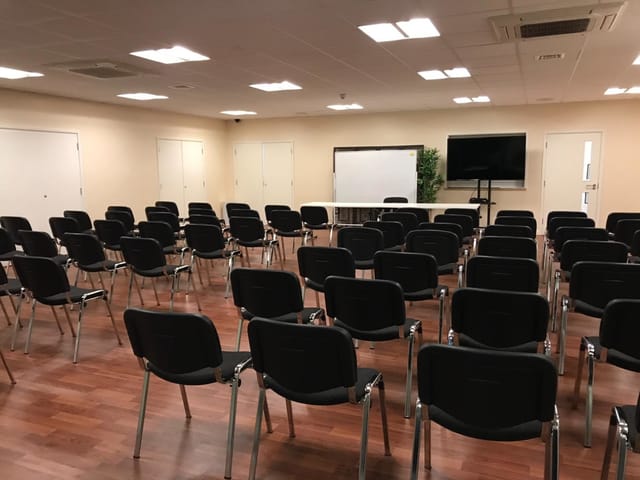 Whole Venue in Whitechapel, London: organized meeting space with black chairs for workshops.