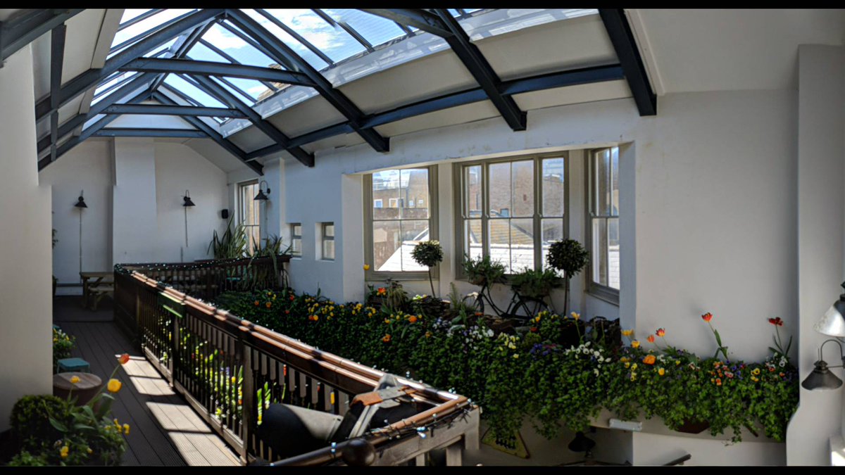 Bright event space at Front Restaurant with large windows, ideal for gatherings and workshops. - Banner