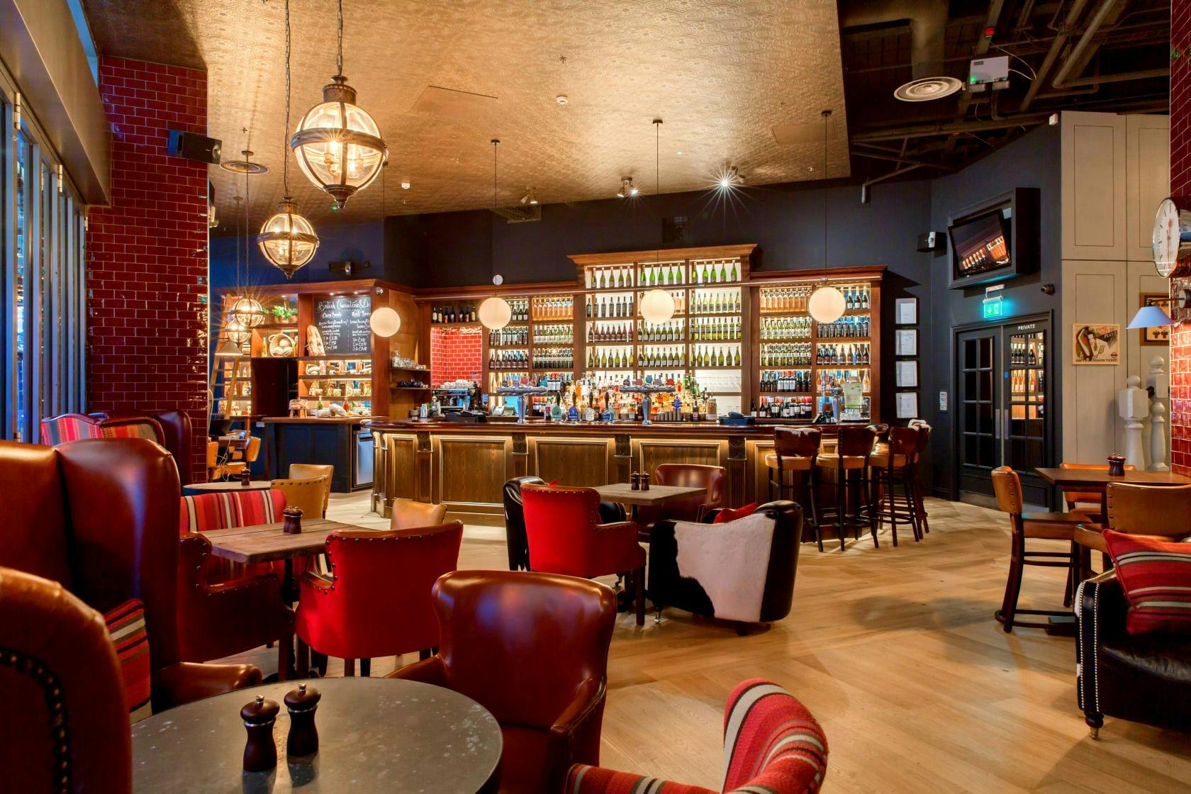 Stylish bar area in The Porter Room, ideal for networking events and cocktail receptions.