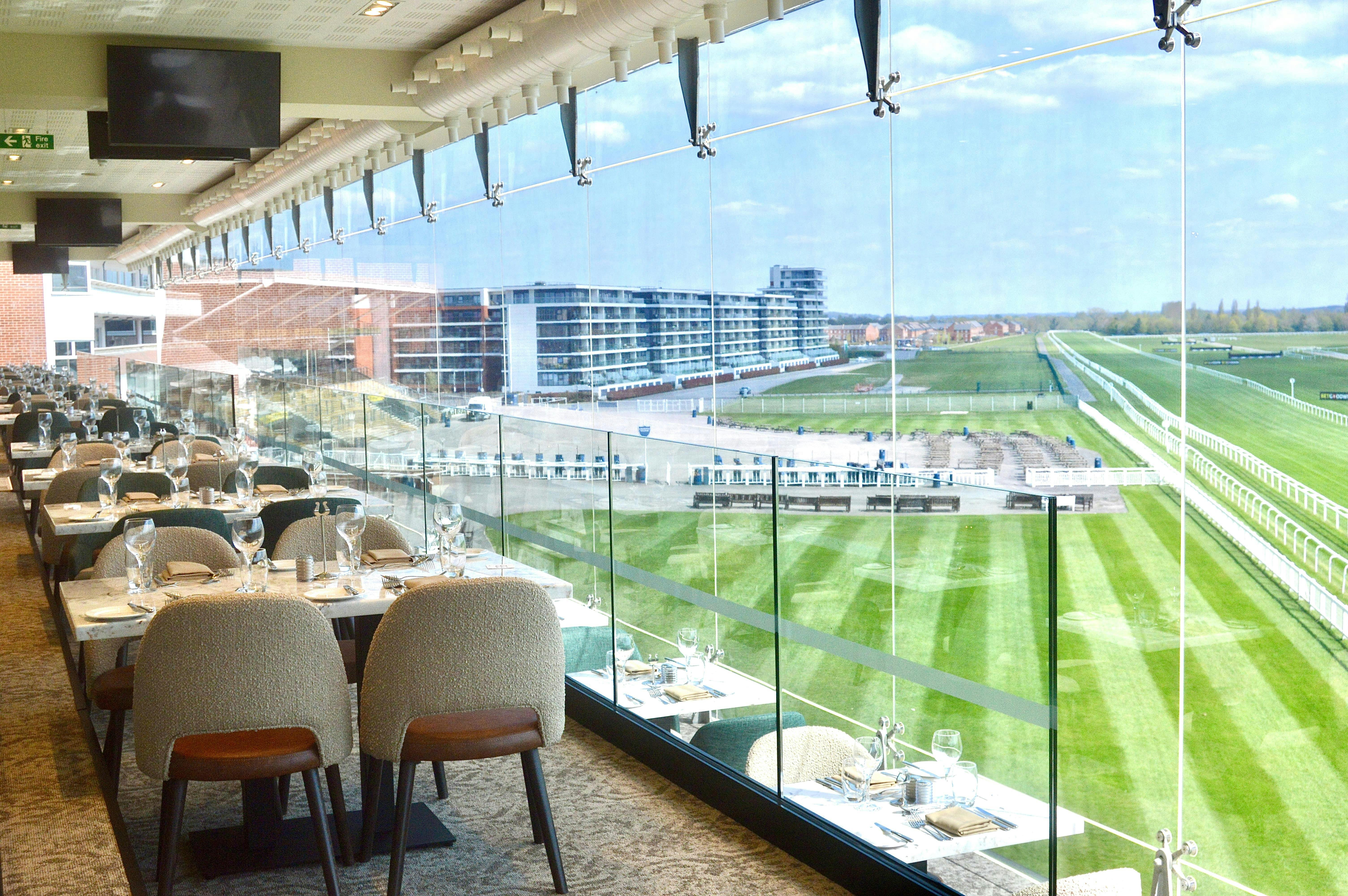 Hennessy Suite at Newbury Racecourse: elegant event space with panoramic racetrack views.