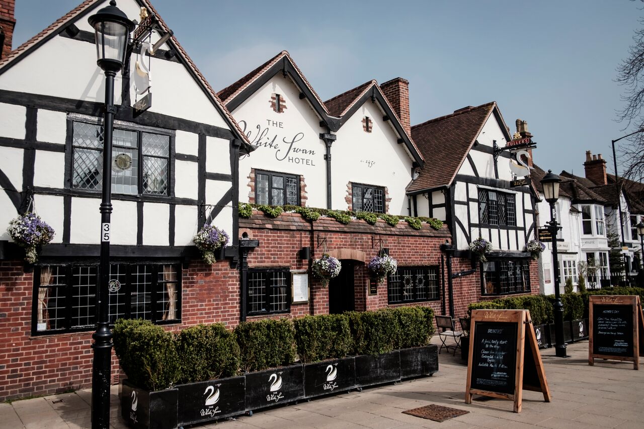 Charming Capulet hotel facade, ideal for corporate retreats and social gatherings.