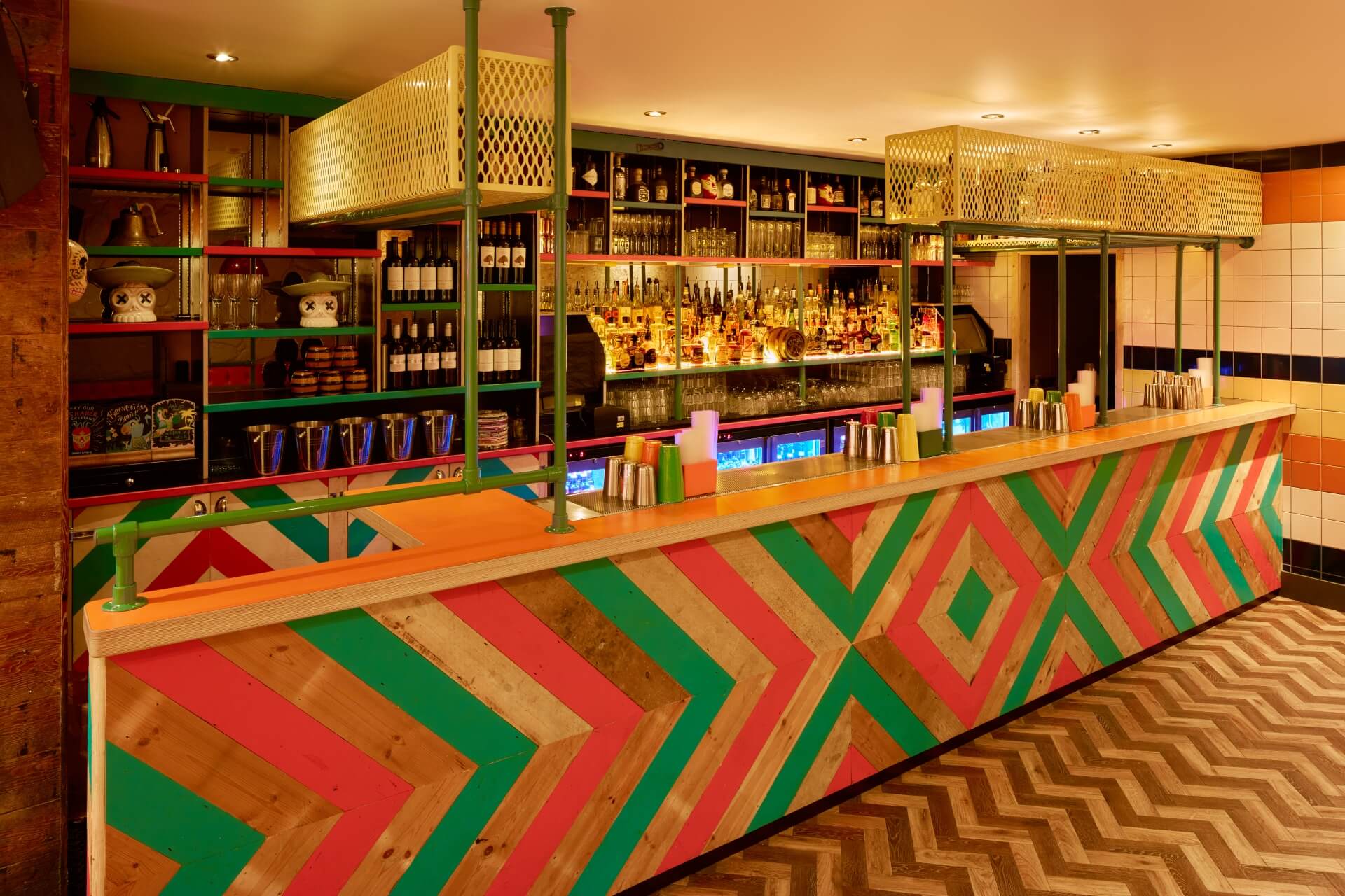 Vibrant bar area in Barrio Soho, perfect for networking events and gatherings.