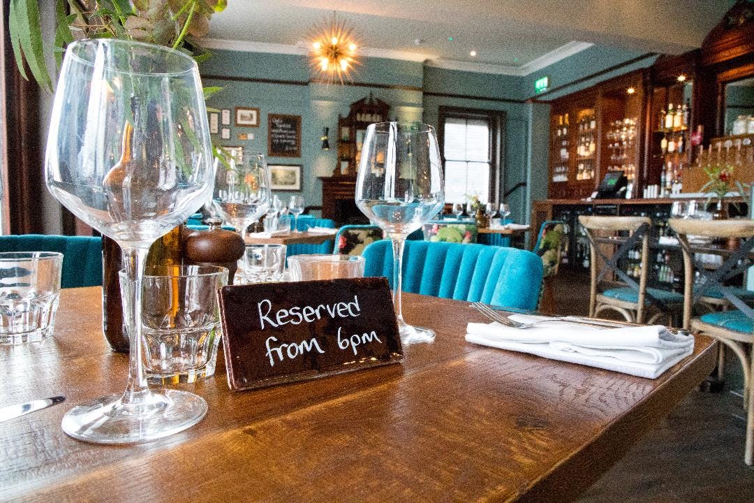 Elegant dining table at Balcony Bar, ideal for corporate events and intimate gatherings.