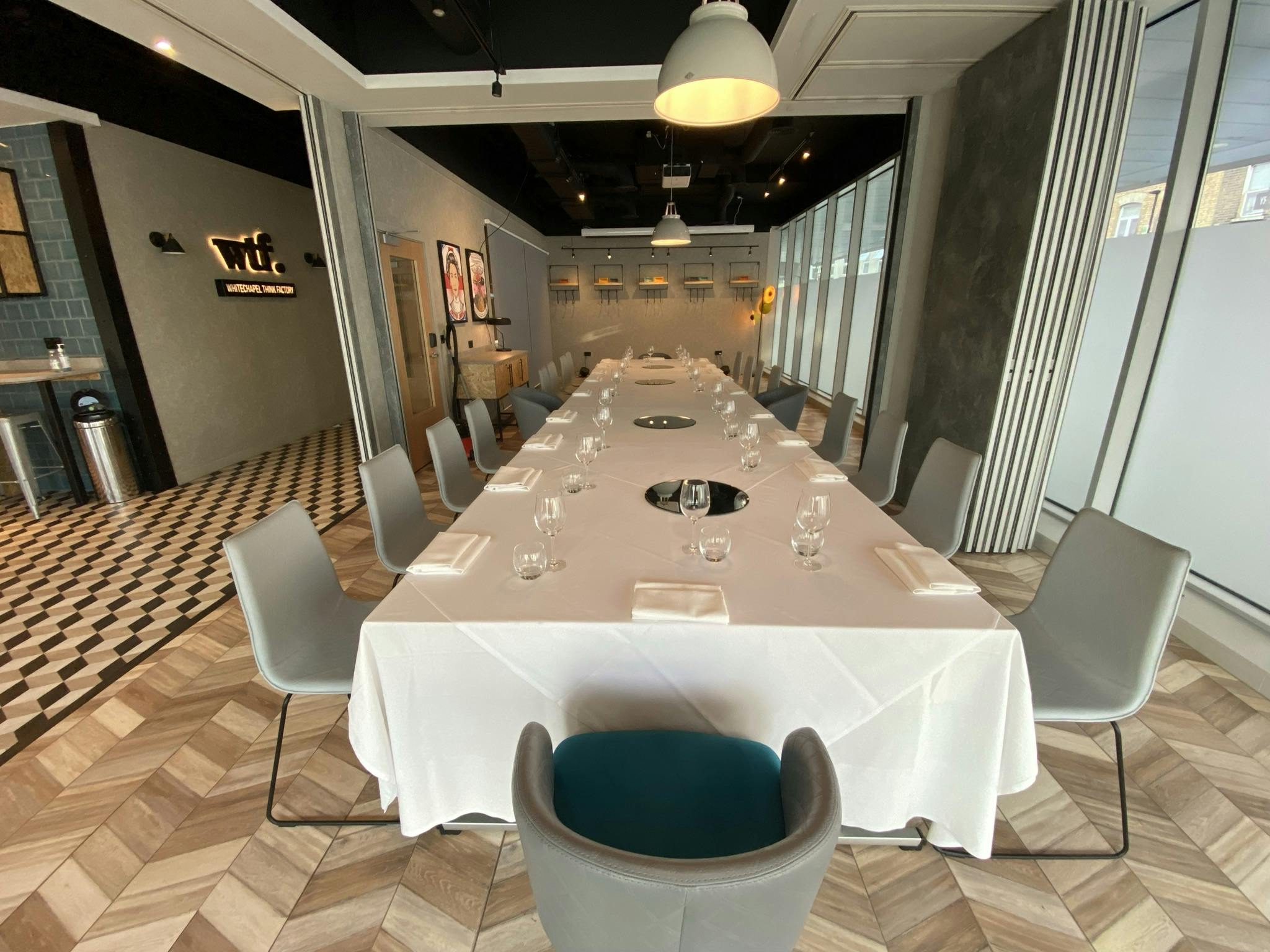 Whitechapel Think Factory meeting space with elegant table for corporate events and workshops.