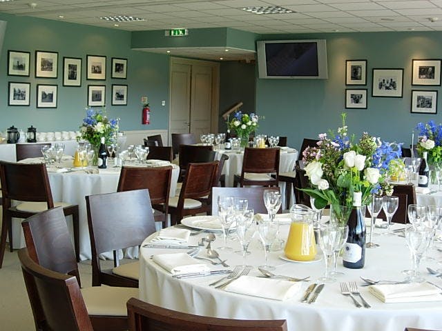 Berkshire Stand event space with elegant tables, ideal for corporate meetings and social events.