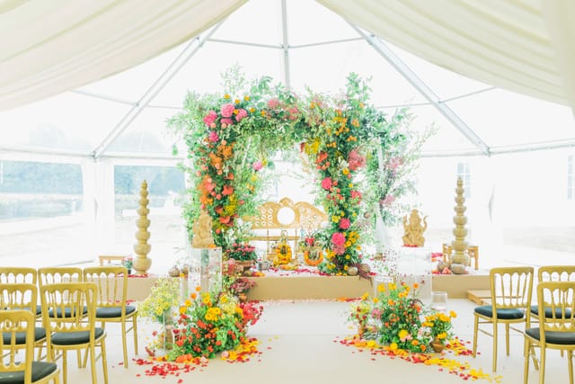 Floral arch in South Lawns, The Queen's House for elegant wedding celebrations.