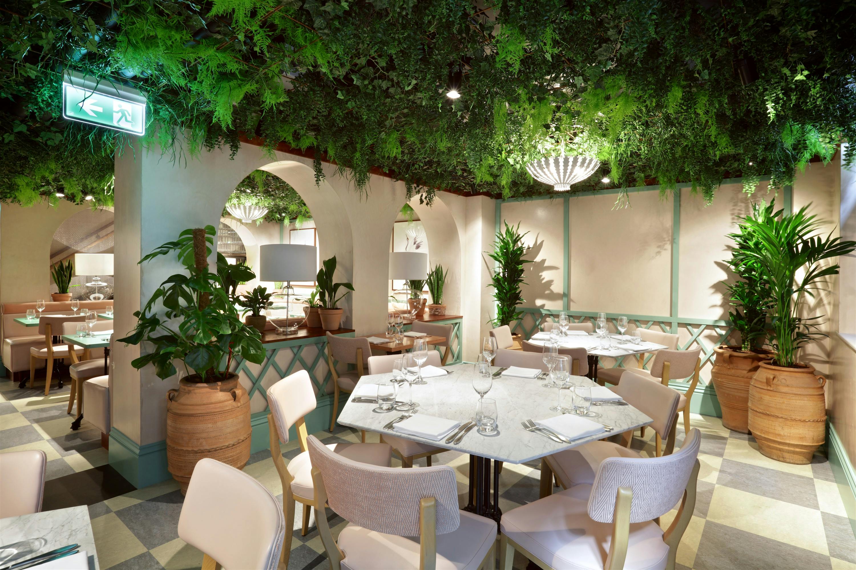 Elegant Garden Room at Kanishka Mayfair, ideal for intimate corporate events and networking.