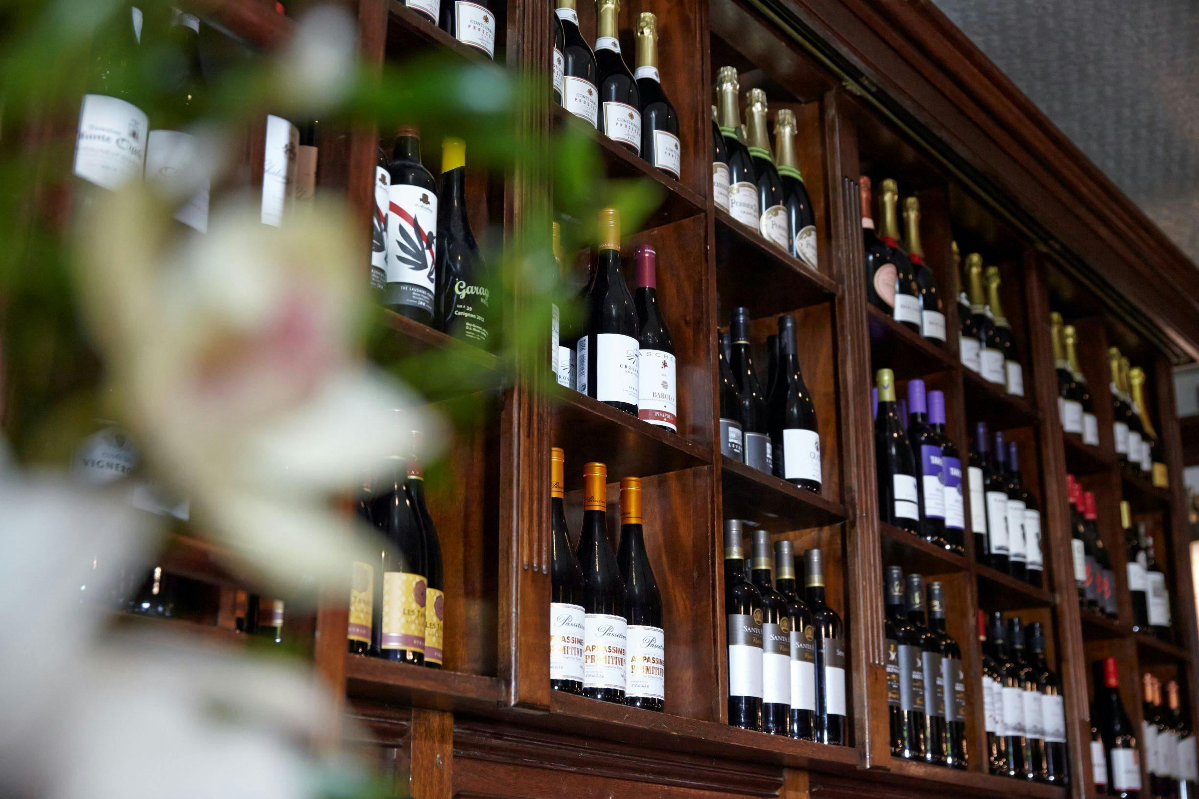 Map Room at Dalys Wine Bar with a stunning wine display for events and tastings.