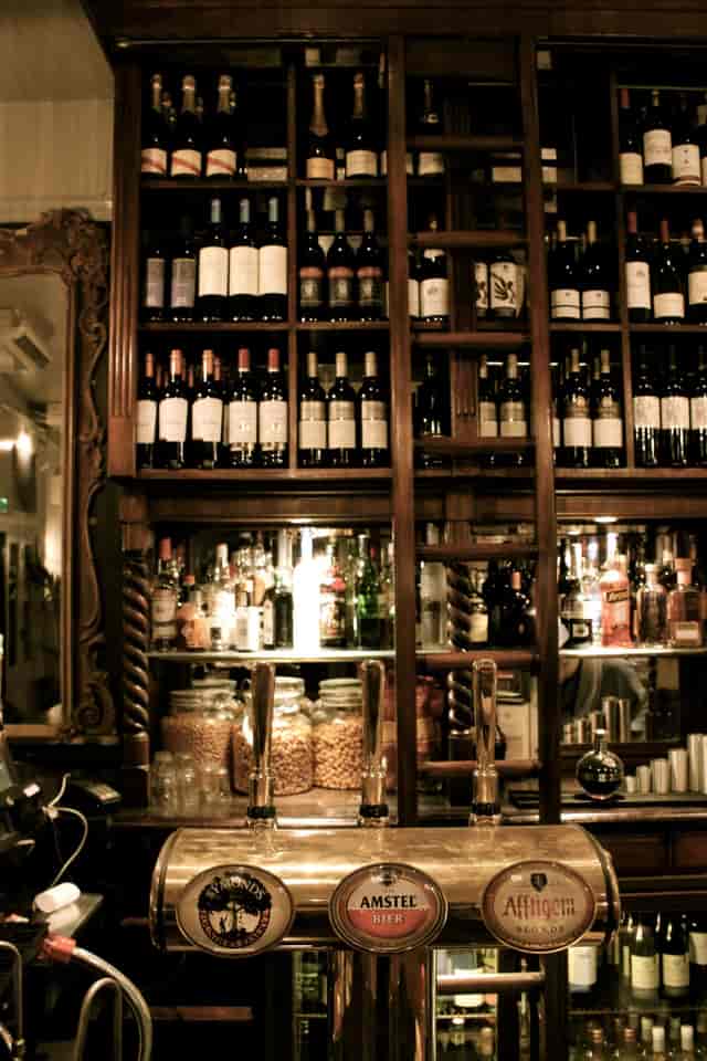 Elegant wine bar with extensive selection, perfect for networking events and celebrations.
