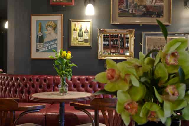 Map Room at Dalys Wine Bar with leather seating, perfect for networking events.