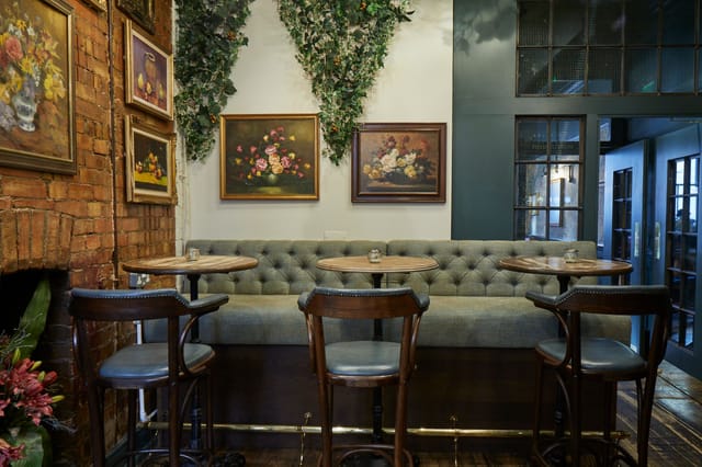 Cozy seating at The Gin Terrace, ideal for networking events and small meetings.
